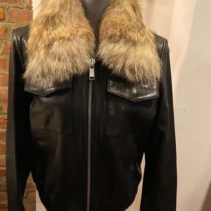 Women’s leather bomber with genuine fur collar